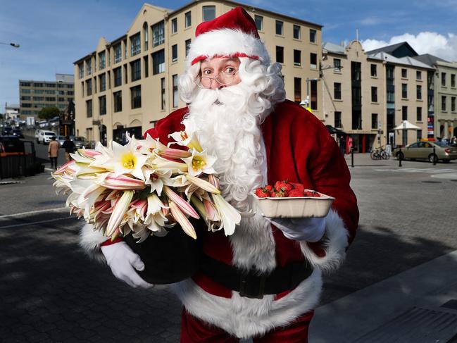 Santa with produce ready for the Christmas Eve edition of Salamanca Market.  Picture: Nikki Davis-Jones