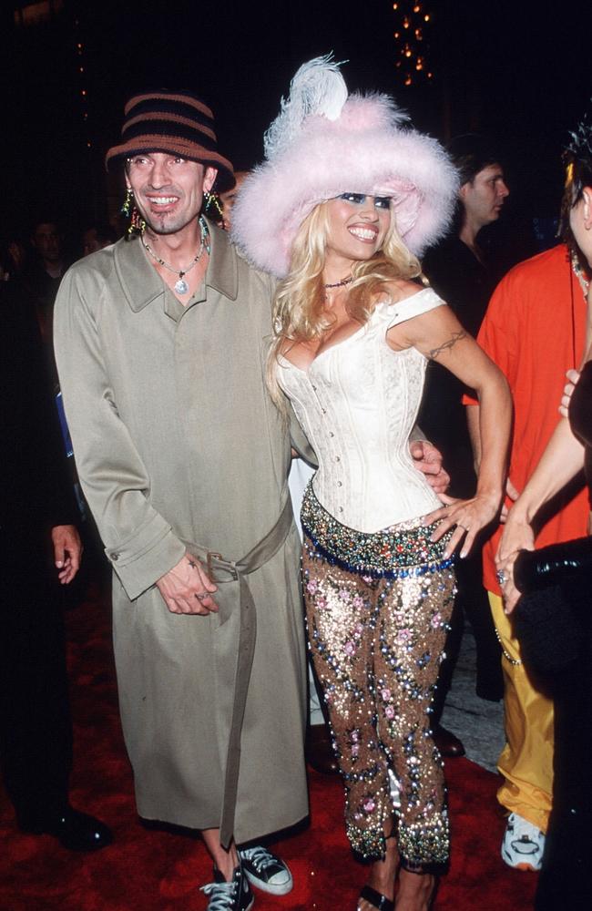 Pamela Anderson, right, with her then-husband Tommy Lee in 1999 at the MTV Video Music Awards in New York. Picture: Evan Agostini/Liaison