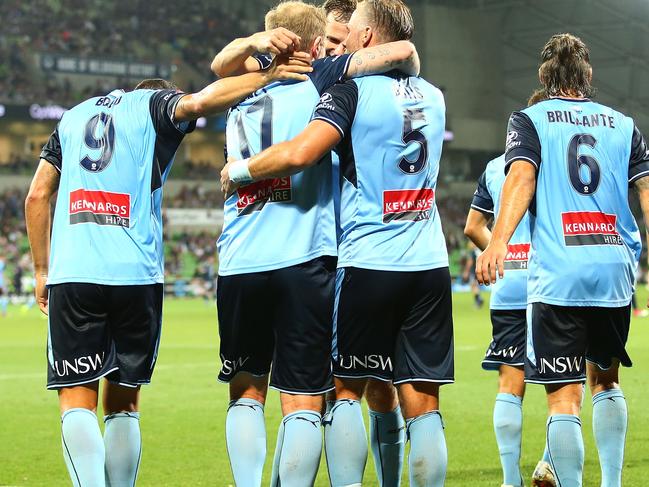 MELBOURNE, AUSTRALIA - JANUARY 26: David Carney of Sydney FC celebrates a goal with team mates during the round 18 A-League match between Melbourne Victory and Sydney FC at AAMI Park on January 26, 2018 in Melbourne, Australia.  (Photo by Jack Thomas/Getty Images)