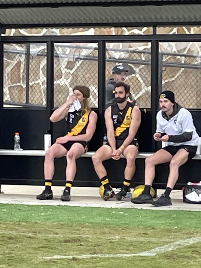 Seaford playing-coach Zac Vansittart recovers on the bench at quarter-time.