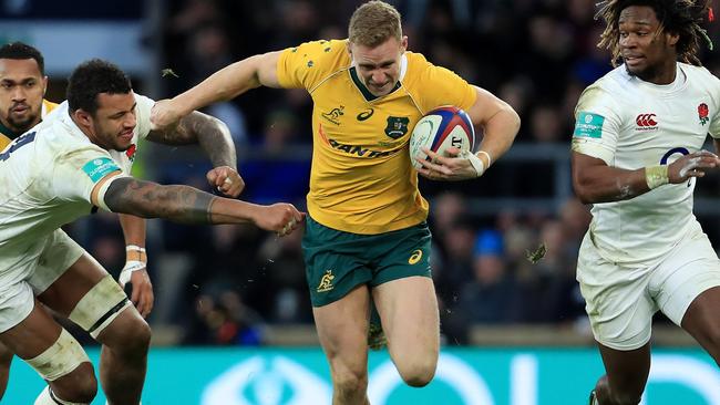 Reece Hodge attempts to break a tackle against England. Picture: Getty Images