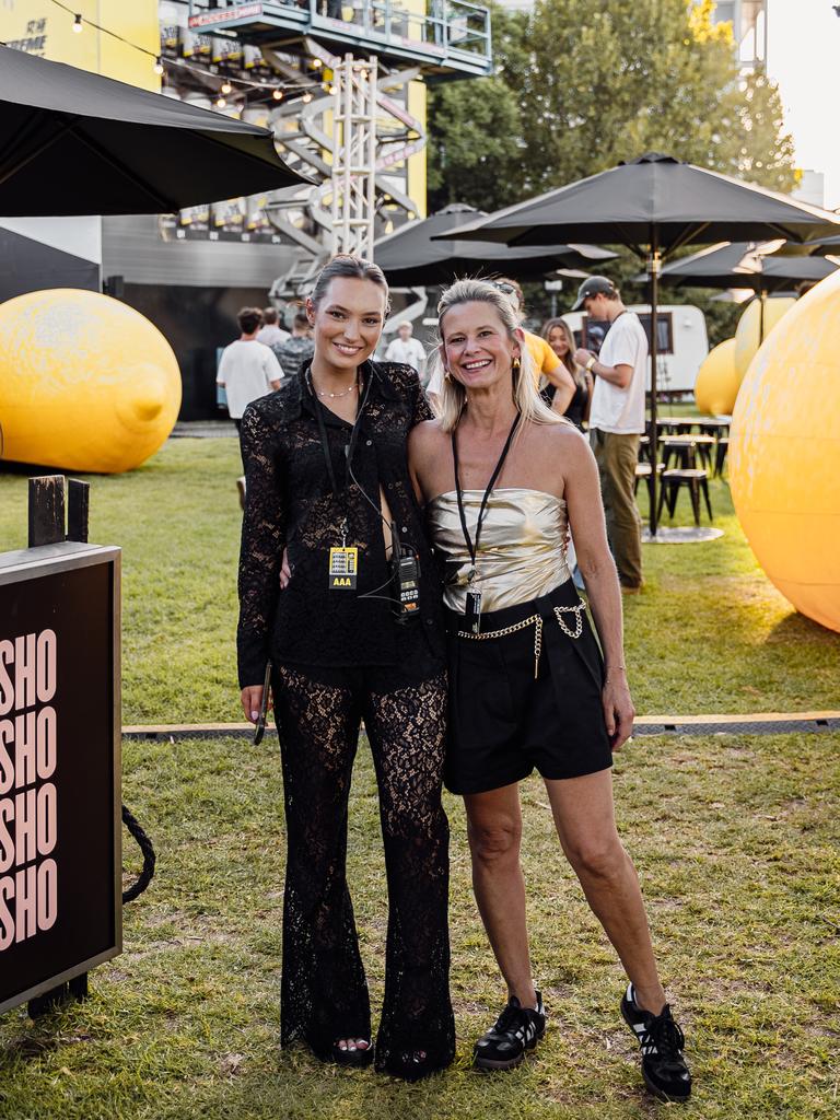 Daisy Buckland (left) and Sarah Abbott from Sassafras PR outside the biggest pop-up vending machine in the world. Picture: Adelaide Fringe Festival