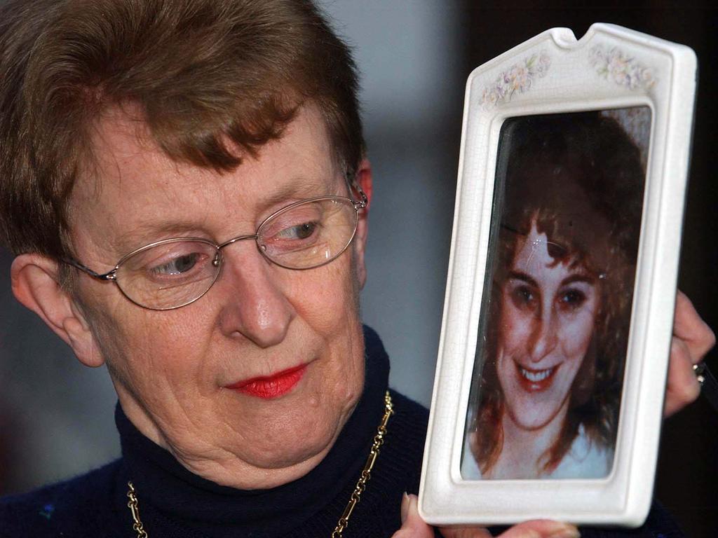 Bev Balding with a picture of her daughter Janine Balding. Picture: Stephen Beazley