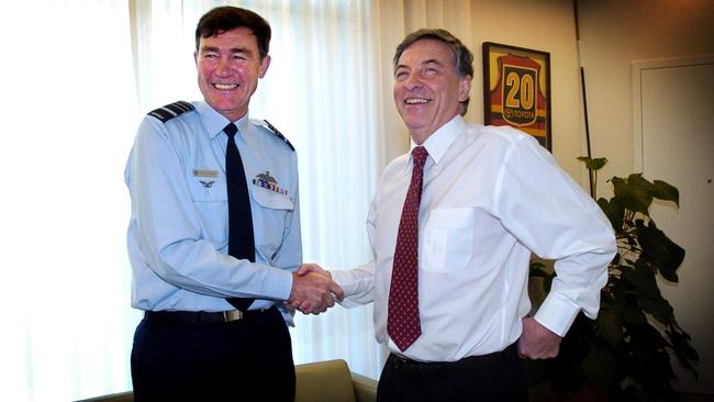 Then defence minister and senator Robert Hill meets with his new Chief of the Defence Force, Air Chief Marshall Angus Houston in 2005. Picture: Ray Strange