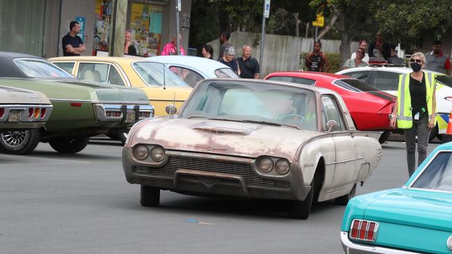 Vintage cars were brought in to create the 1980s set. Picture: Annette Dew