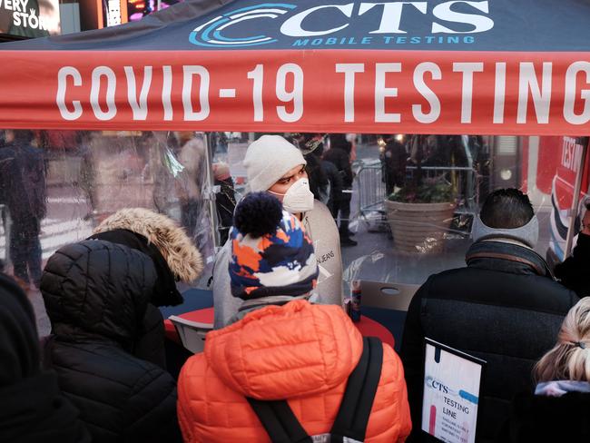 People wait in long lines in New York’s Times Square to get tested for Covid-19. Picture: Getty Images/AFP