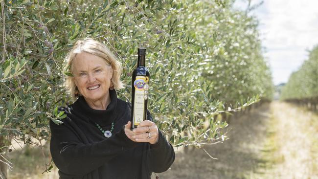 Tina Knight in her olive grove on her farm near Rushworth. Picture: Zoe Phillips