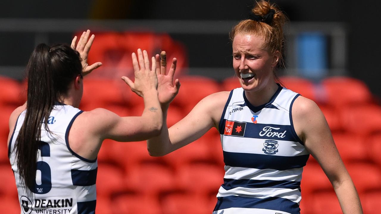 Aishling Moloney (right) celebrates one of her four goals for Geelong on Saturday. Picture: Matt Roberts/Getty Images