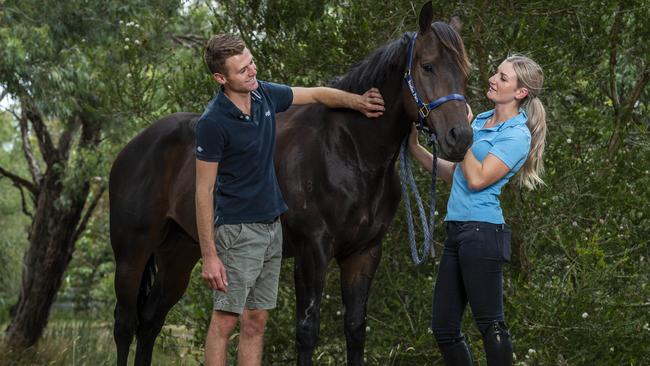 Jockey Jamie Kah and partner Clayton Douglas at their Mornington Peninsula property. Picture: Jake Nowakowski