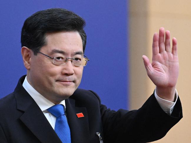 China's Foreign Minister Qin Gang waves as he arrives for a press conference at the Media Center of the National People's Congress (NPC) in Beijing on March 7, 2023. Picture: AFP