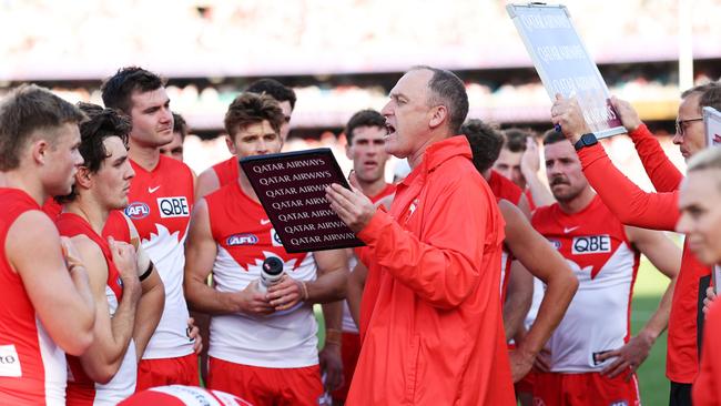 John Longmire speaks to his players. Picture: Matt King/AFL Photos/via Getty Images