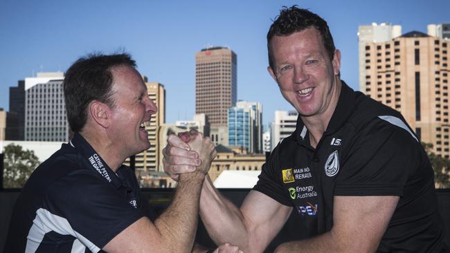 Good mates Bradley Gotch and Garry Hocking ham it up ahead of their face-off as South Adelaide and Port Adelaide coaches in 2014. Picture: Matt Turner