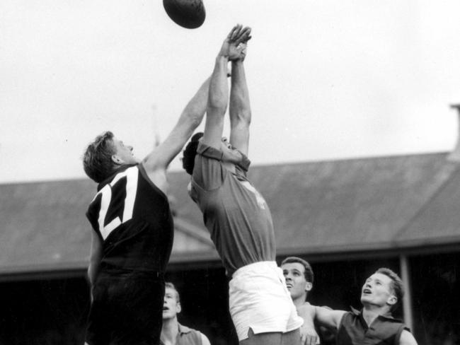 Footballer Fred Bills with Bob Morrell, Lindsay Head and Haydn Bunton.SANFL football - Norwood vs West Torrens match. a/ct /Football/SANFL