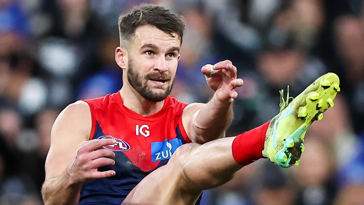 MELBOURNE, AUSTRALIA - JUNE 12: Joel Smith of the Demons kicks the ball during the 2023 AFL Round 13 match between the Melbourne Demons and the Collingwood Magpies at the Melbourne Cricket Ground on June 12, 2023 in Melbourne, Australia. (Photo by Dylan Burns/AFL Photos)