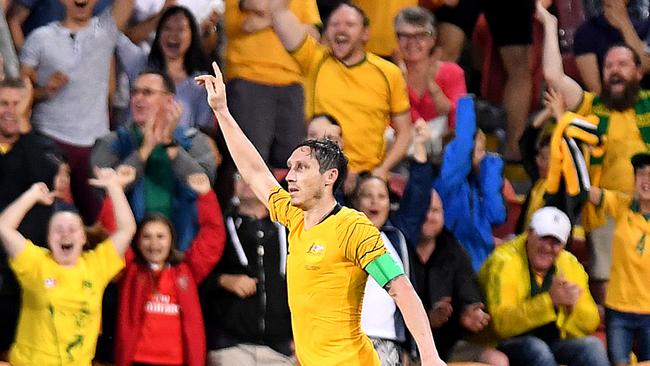 Graham Arnold would love for Mark Milligan to stay on with the Socceroos.