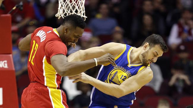 Houston Rockets' Dwight Howard and Golden State Warriors' Andrew Bogut.