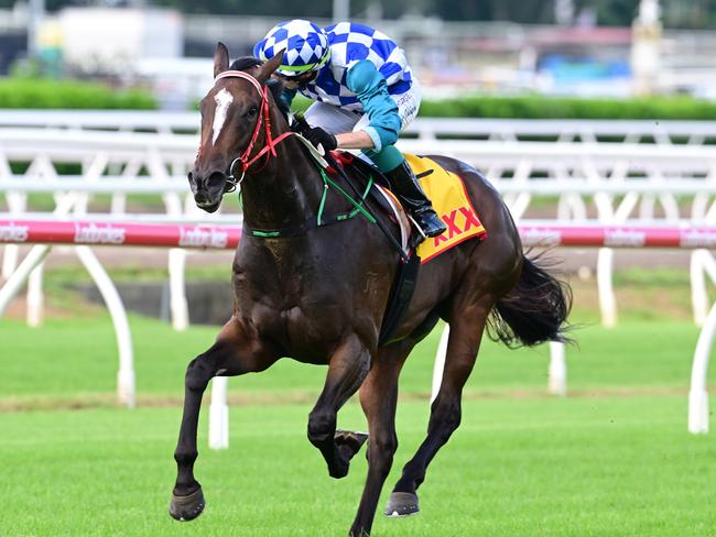 Exotique Miss dashes clear at Eagle Farm under jockey Robbie Dolan to become a winter carnival contender. Picture: Grant Peters - Trackside Photography.