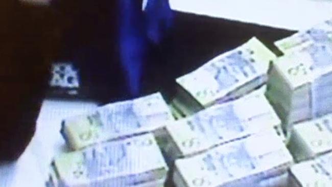 CCTV footage of a man exchanging huge piles of cash for gaming chips at Crown Melbourne was first aired in media reports, sparking the NSW probe.