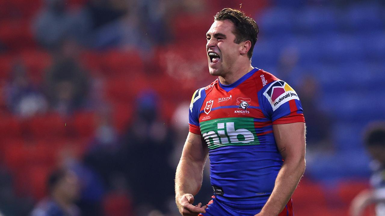 NEWCASTLE, AUSTRALIA - JULY 03: Connor Watson of the Knights celebrates his try during the round 16 NRL match between the Newcastle Knights and the North Queensland Cowboys at McDonald Jones Stadium, on July 03, 2021, in Newcastle, Australia. (Photo by Ashley Feder/Getty Images)