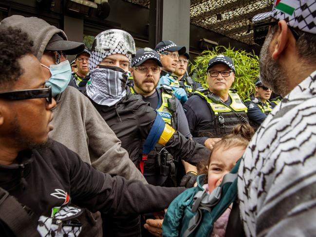 MELBOURNE, AUSTRALIA. NewsWire Photos. SEPTEMBER 8, 2024. Protesters come face-to-face with Victoria Police during a pro-Palestinian rally in Melbourne. The demonstration saw moments of tension as participants engaged with police officers. Picture: NewsWire/Tamati Smith.