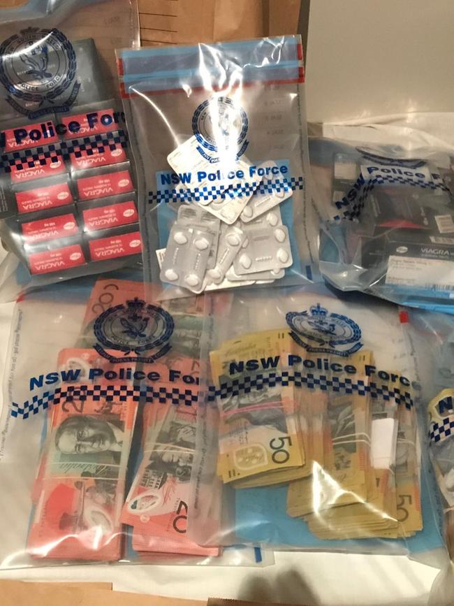 Cash and prohibited drugs seized by police. Picture: NSW Police