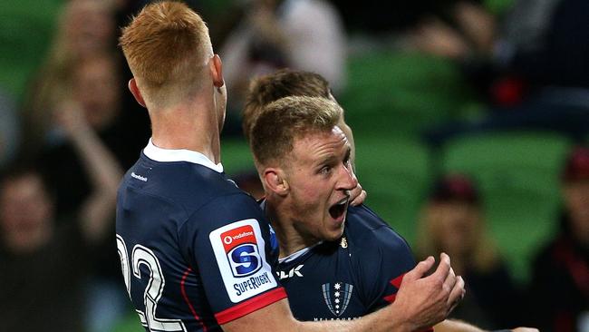 Reece Hodge and Campbell Magnay celebrate a try. Picture: AAP Images 