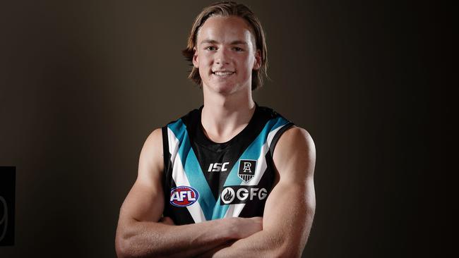 Draft Selection Number 14 Miles Bergman of the Port Adelaide Power poses for a photograph during the first round of the 2019 AFL Draft at Marvel Stadium in Melbourne, Wednesday, November 27, 2019. (AAP Image/Scott Barbour) NO ARCHIVING