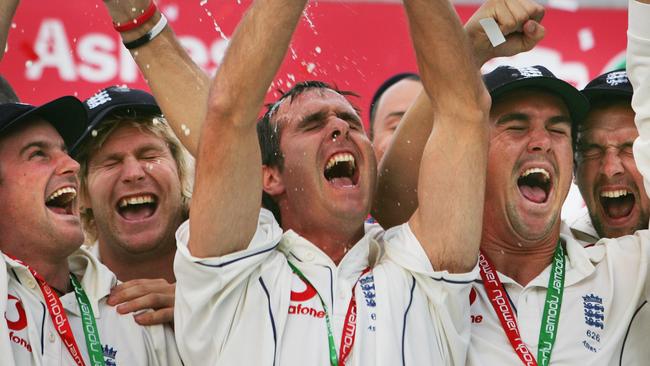England captain Michael Vaughan raises The Ashes urn as his teammate in 2005.