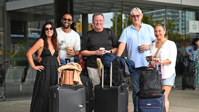 Alicia Gilmore, Aqib Hossain, Ben Salter, Wim Eshuys and Lora Meni flying out of the Brisbane Airport. Picture: John Gass