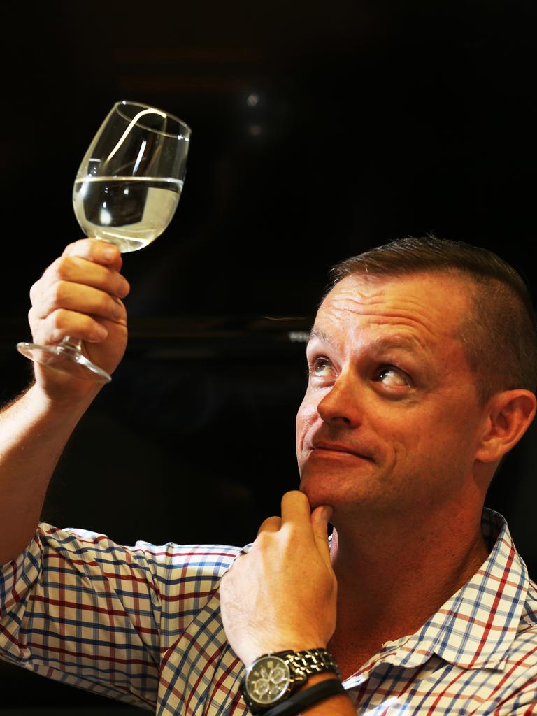 Troy Pettiford from the Whitsunday shire council samples some of the water. Picture Glenn Hampson