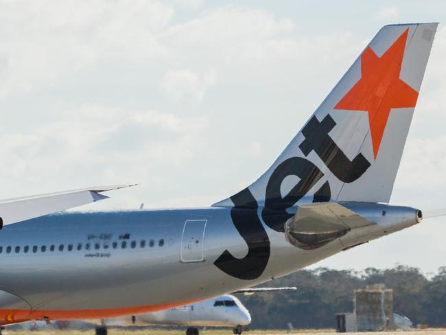 ESCAPE: Jetstar and Qantas aircraf tails. Picture: Jetstar