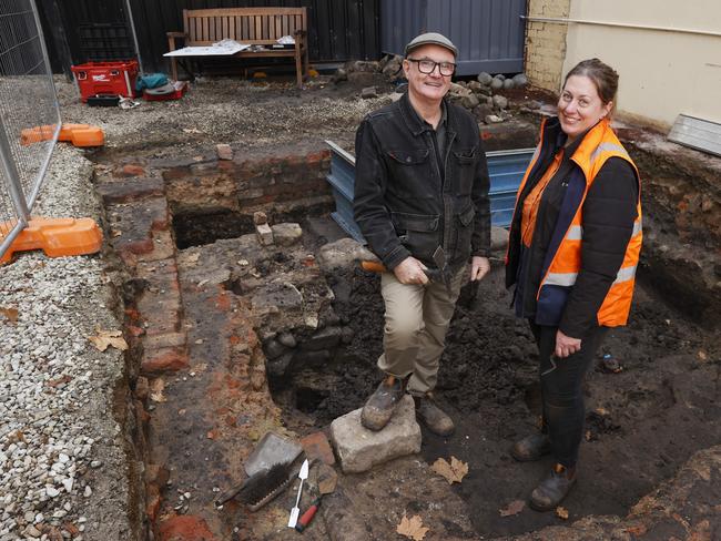 John Kelly owner of the Hope & Anchor pub with Doctor Jennifer Jones-Travers archaeologist and director of Latitude Heritage who is involved with the dig.  An archaeological dig at the vacant site adjacent to the Hope & Anchor pub in Hobart has uncovered some treasures from years gone by.  Picture: Nikki Davis-Jones