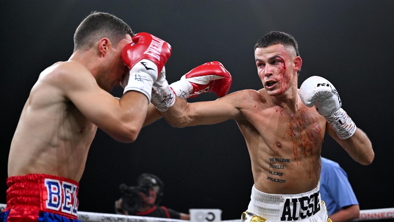 Harry Garside punches Charlie Bell in their fight. Pictures: No Limit Boxing/Gregg Porteous