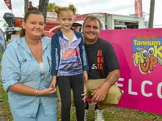 GREAT CATCH: Adele, Serenity and Christopher Stephens at the Boyne Tannum HookUp 2019. Adele and Christopher's romance started six years ago at the fishing event. Picture: Matt Taylor