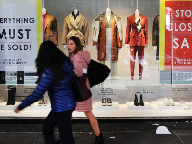 ONE TIME WEB USE ONLY - FEE APPLIES FOR REUSE -  NEW YORK, NEW YORK - NOVEMBER 06: Window signs announce the first days of a liquidation sale at the iconic New York department store Barney's on November 06, 2019 in New York City. Barney's, which had been a destination stop for wealthy and fashion conscious shoppers for years, was recently sold in two parts in a $271 million deal. As part of the transaction, Barney's intellectual property will go to the licensing firm Authentic Brands Group. The closing of Barney's is another development in the crisis facing many retail stores in America as consumers shift to online shopping. (Photo by Spencer Platt/Getty Images)