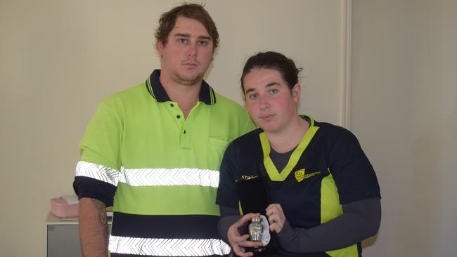 Natasha Tacon and Braeden Carolan holding their baby boy's urn. Picture: Aden Stokes