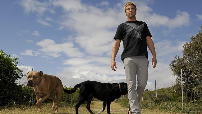 POINT BREAK: Blake Thornton enjoys some down timewith his dogs