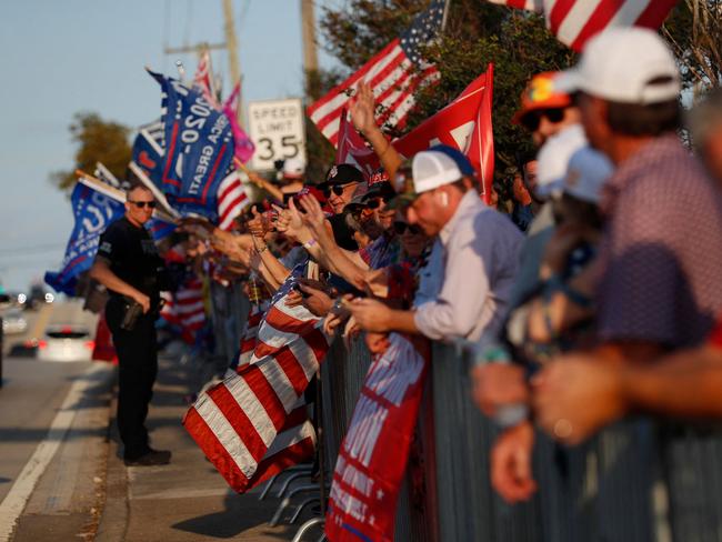 Supporters of Donald Trump gather near his residence at the Mar-a-Lago Club. Picture: Getty/AFP