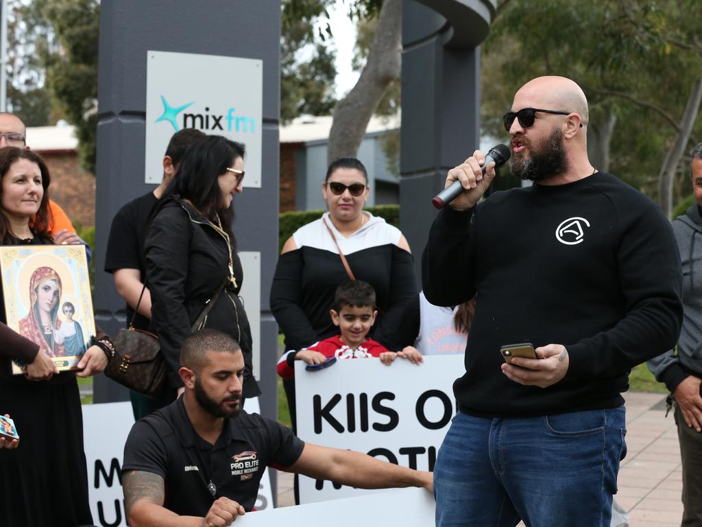 Protestors have begun to gather outside Kiis FM headquarters in North Ryde to protest against comments Kyle Sandilands made about Christians and the Virgin Mary. Protest leader Georgie Mark speaks to the protestors. Picture: David Swift.