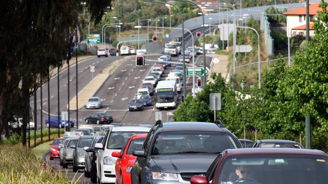 A typical morning traffic jam on Norwest Blvd in Norwest Business Park off Old Windsor Rd. Pictures: Jeff Herbert