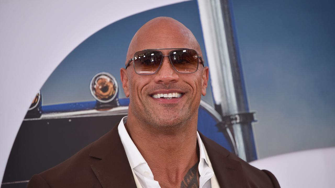 Dave Bautista shades The Rock after he's asked if he wants to be