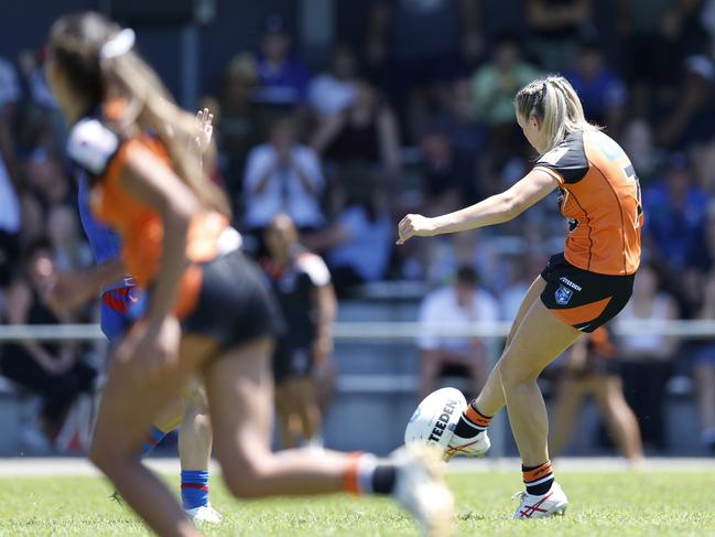 Katie Stevens kicks downfield. Picture: Michael Gorton