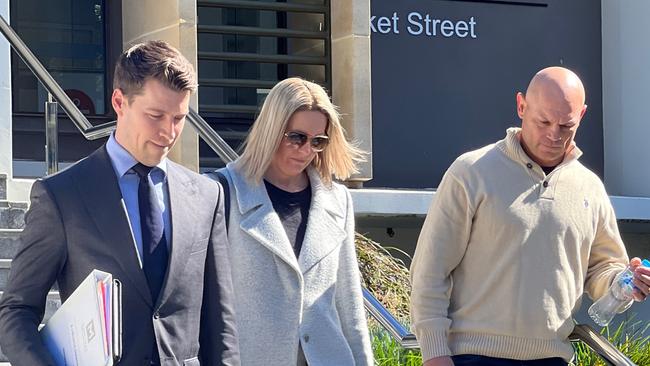 Ex NRL WAG Belinda Simmonds leaving Wollongong Local Court with lawyer Matt Ward and husband Reece Simmonds. Picture: Dylan Arvela