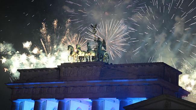 Fireworks illuminate the Quadriga atop the Brandenburg Gate. Picture: AFP