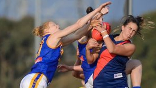 Chloe Molloy take a mark for Diamond Creek in the VFL Women's competition. Picture: Russ Cunham