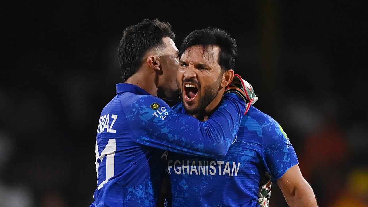 Afghanistan stuns sloppy Australians in historic scenes to keep T20 World Cup dream alive