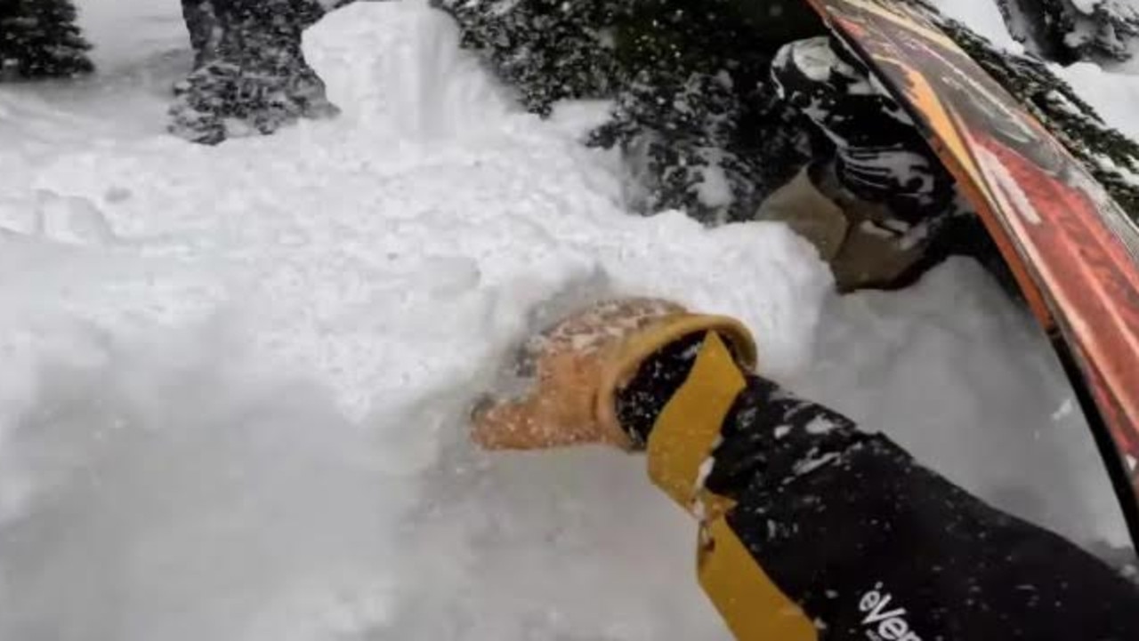 The skier quickly tunneled into the deep snow alerting the trapped man that he was being rescued.