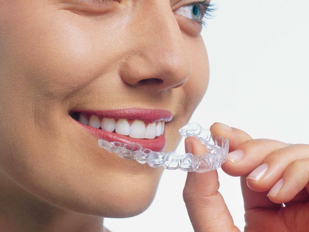 Invisalign charges SmileDirectClub made false claims about care from real  dentists in its ads