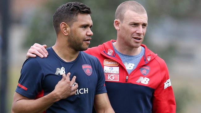 Neville Jetta chats to coach Simon Goodwin. Picture: Michael Klein