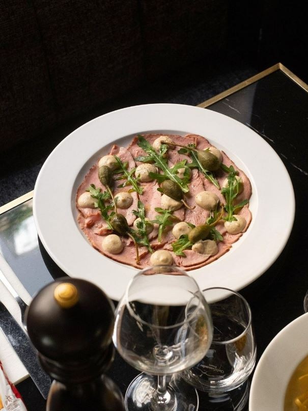 A mortadella dish at the Paris venue closely resembles something found on the Bondi menu. Picture: Instagram